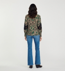 Long sleeve collared shirt, green black beige paisley, black lace trim, smocked cuffs, back view.