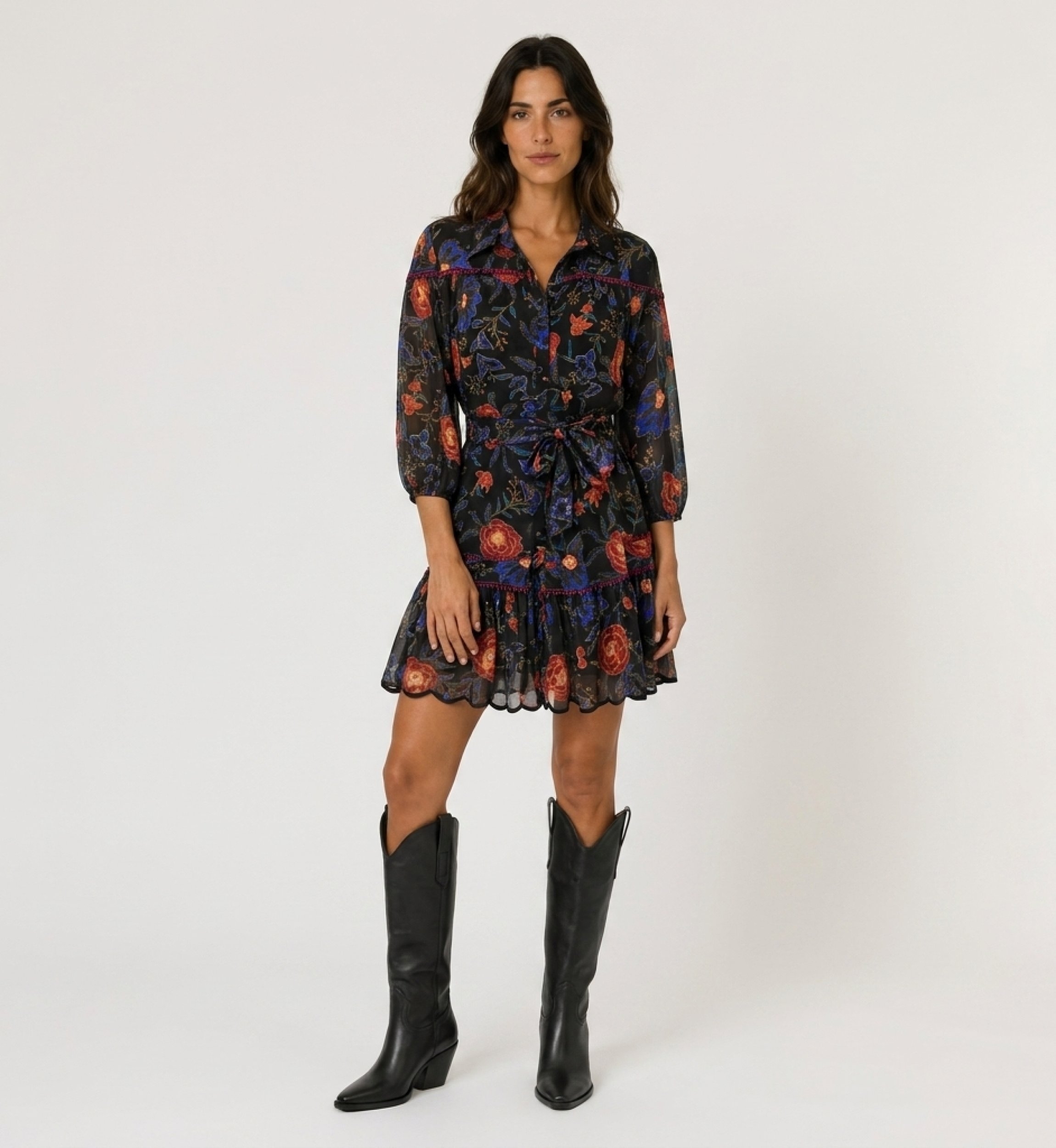 Black floral mini dress with red and blue flowers, collared, 3/4 balloon sleeves, tie waist, tiered scalloped hem.
