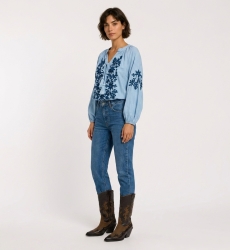 Black long-sleeve peasant blouse, v-neck with ties, cream floral embroidery on linen-look fabric, three-quarter view.