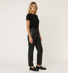 Stylish women's leather pants, shown from a three-quarter side view. Features a modern, sleek cut.