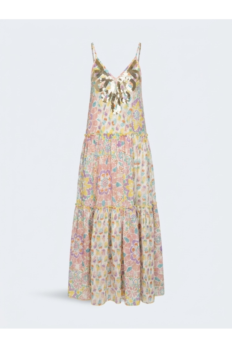White tiered maxi dress with thin straps, V-neck, gold/silver sequins, and vibrant floral pattern. Full view.