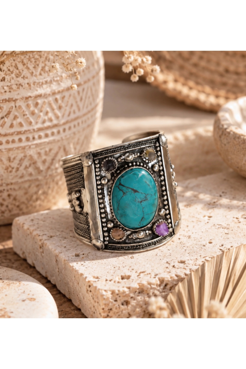 Manchette argentée Sphinx à cabochon aqua | Miss June Paris